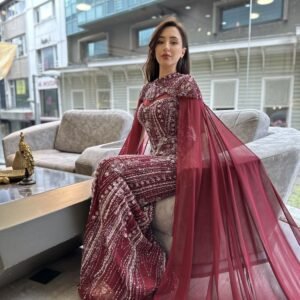 Burgundy Beaded Mermaid Evening Gown With Cape Sleeves