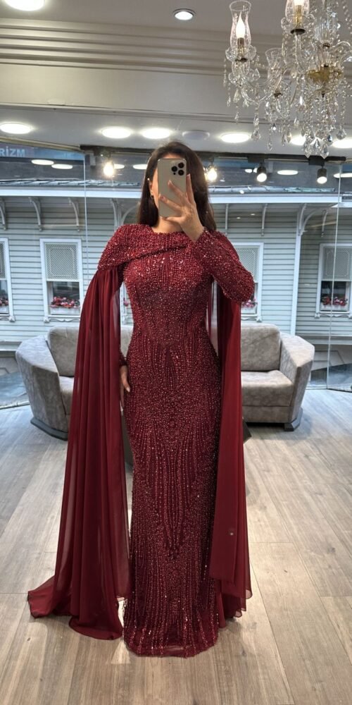 Burgundy Long Sleeve Beaded Evening Gown With Draped Cape