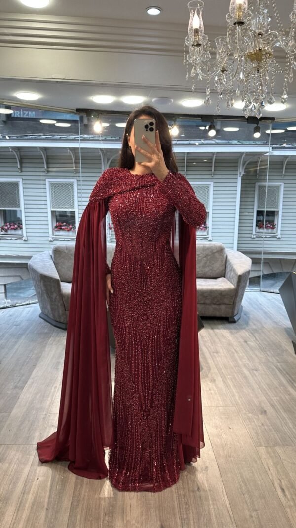 Burgundy Long Sleeve Beaded Evening Gown With Draped Cape Burgundy Long Sleeve Beaded Evening Gown With Draped Cape