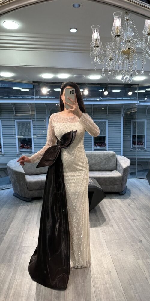White Beaded Evening Gown With Black Satin Bow