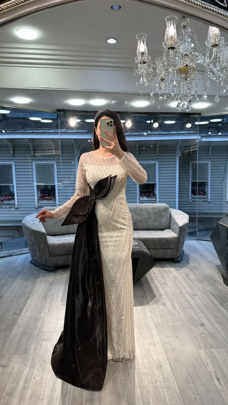 White Beaded Evening Gown With Black Satin Bow