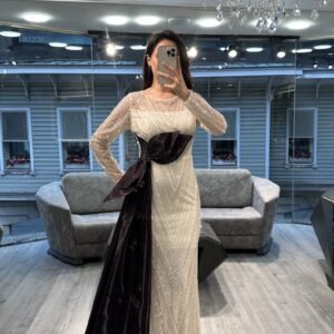 White Beaded Evening Gown With Black Satin Bow White Beaded Evening Gown With Black Satin Bow