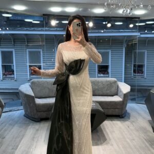 White Beaded Evening Gown With Black Satin Bow White Beaded Evening Gown With Black Satin Bow